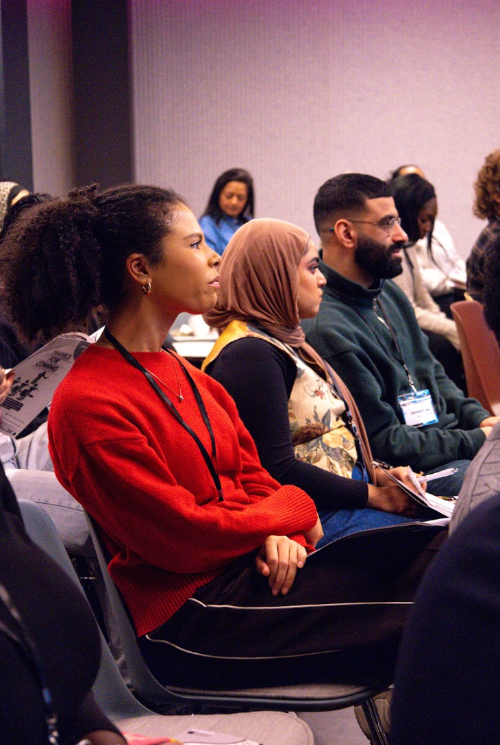 Participant listening intently in a TRIUMPH session
